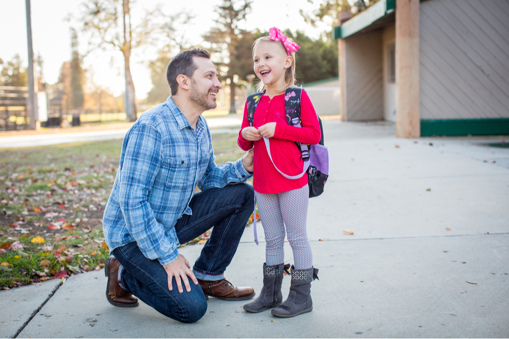 Father picking up daughter from school - his employer navigates workplace law