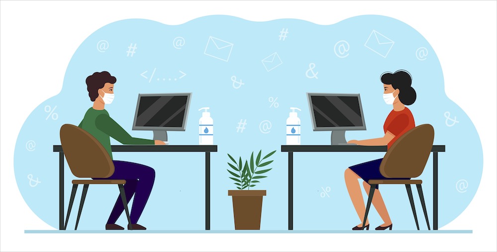 Illustration of two workers sitting at separate desks with masks on to show social distancing and COVID safety in the workplace