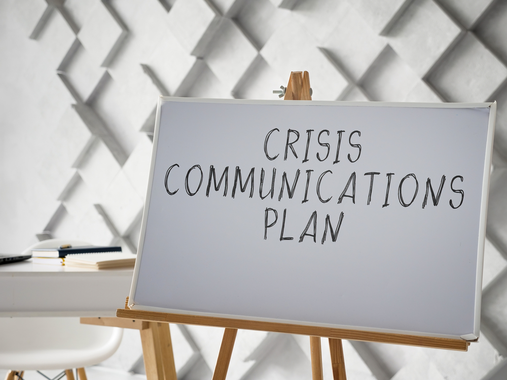 Board with the text Crisis Communications Plan
